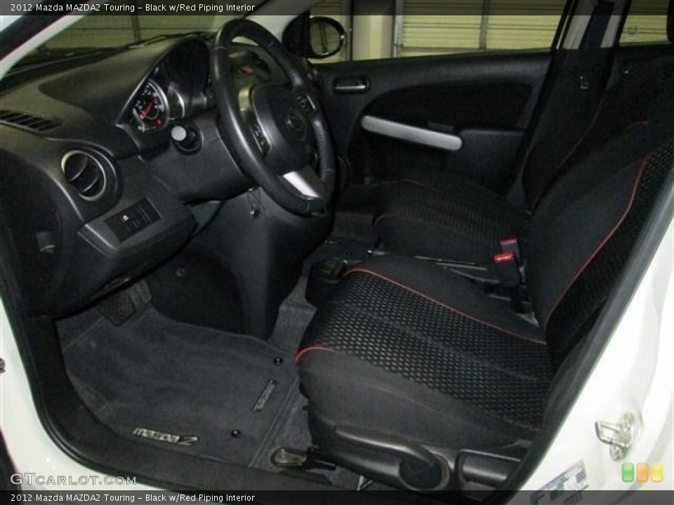Black w/Red Piping Interior Photo for the 2012 Mazda MAZDA2 Touring #82591228