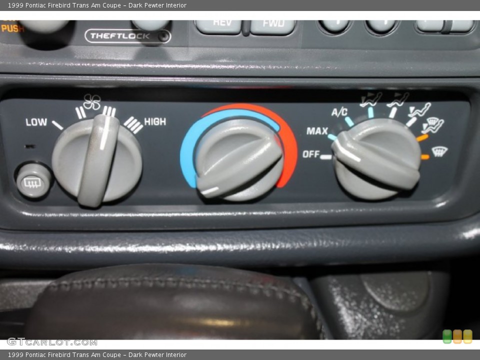 Dark Pewter Interior Controls for the 1999 Pontiac Firebird Trans Am Coupe #82604726
