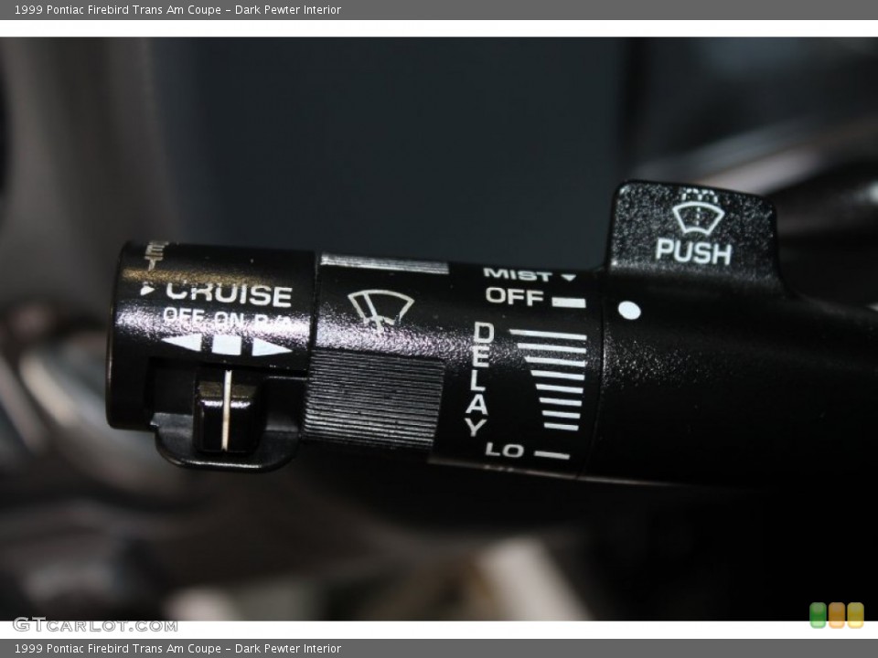 Dark Pewter Interior Controls for the 1999 Pontiac Firebird Trans Am Coupe #82604820