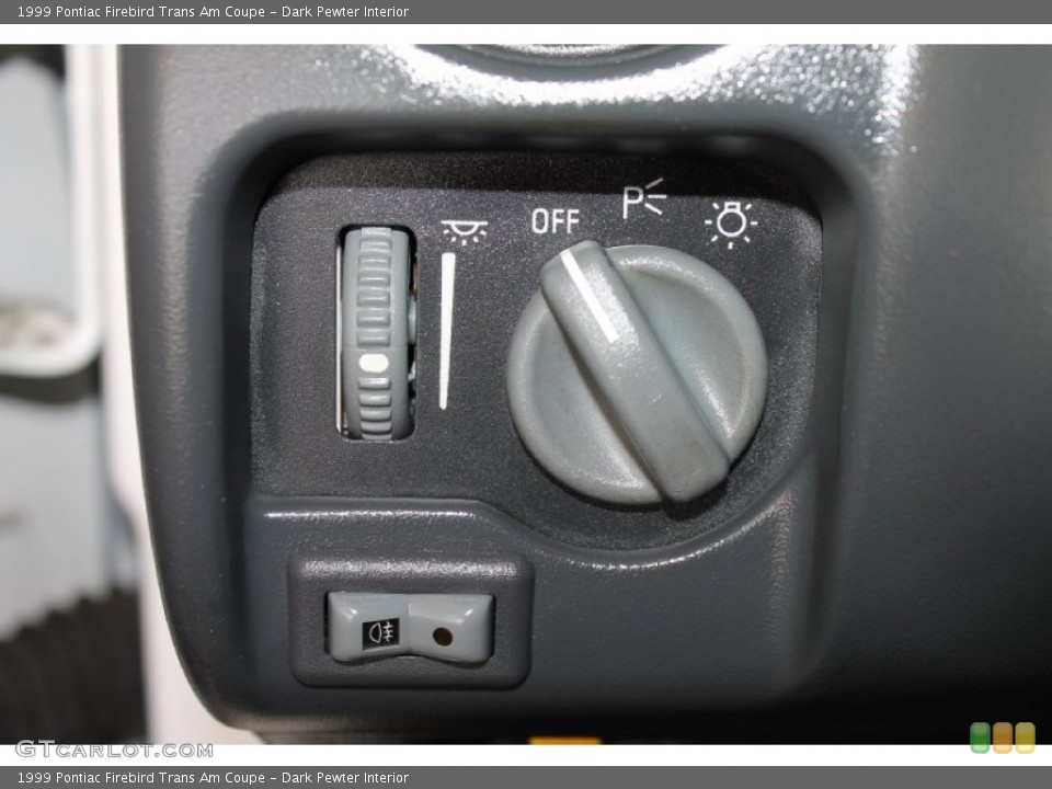Dark Pewter Interior Controls for the 1999 Pontiac Firebird Trans Am Coupe #82604834