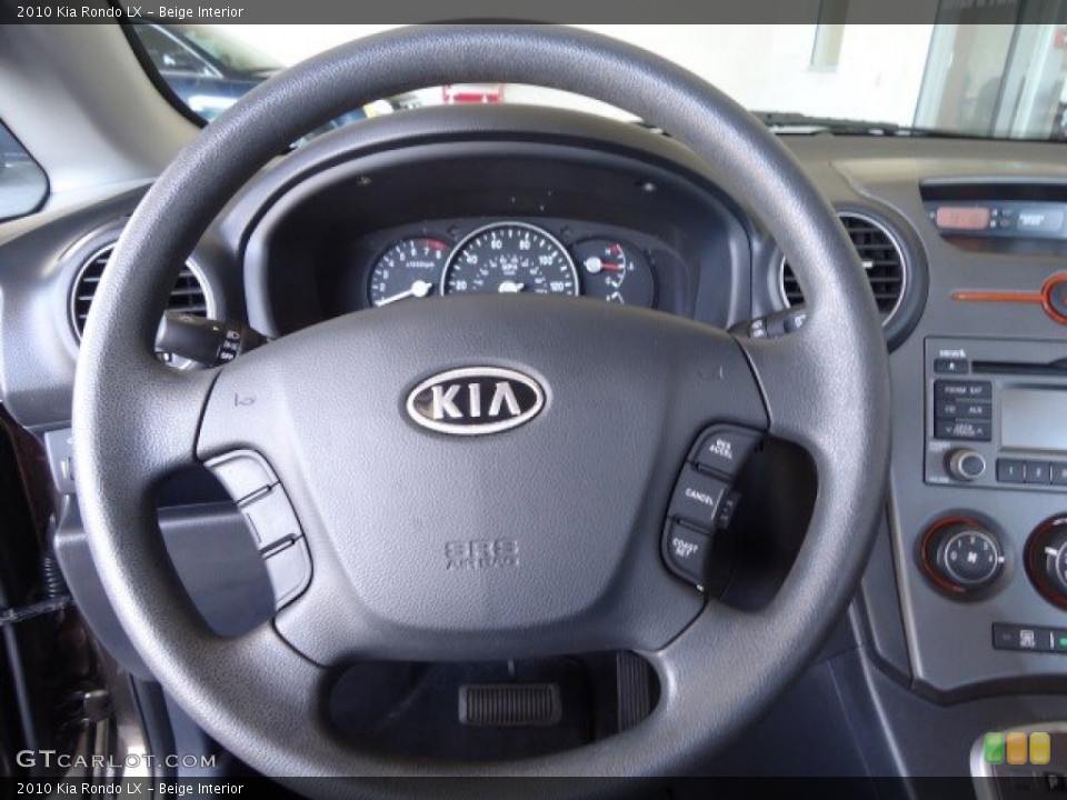 Beige Interior Steering Wheel for the 2010 Kia Rondo LX #82605041