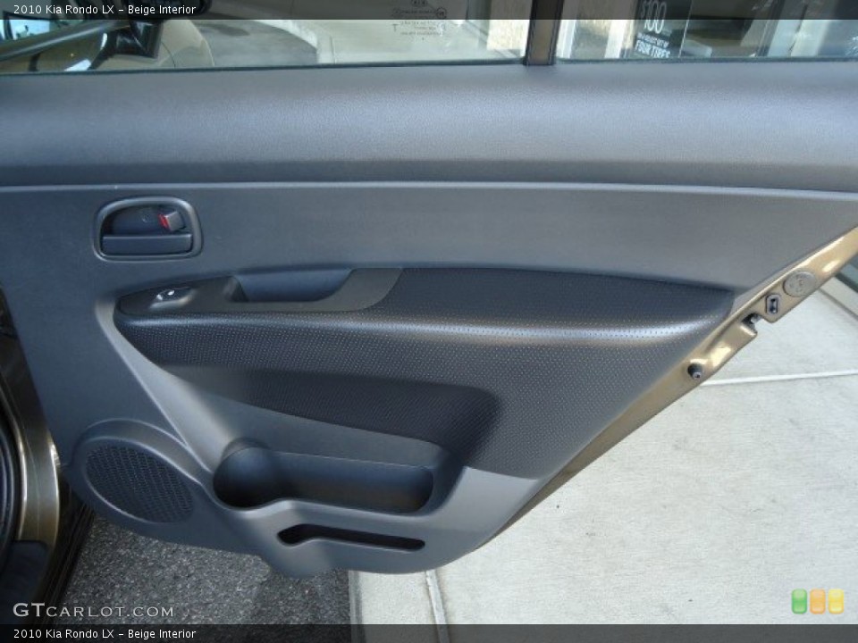 Beige Interior Door Panel for the 2010 Kia Rondo LX #82605387