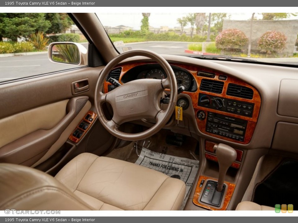 Beige Interior Dashboard for the 1995 Toyota Camry XLE V6 Sedan #82634192