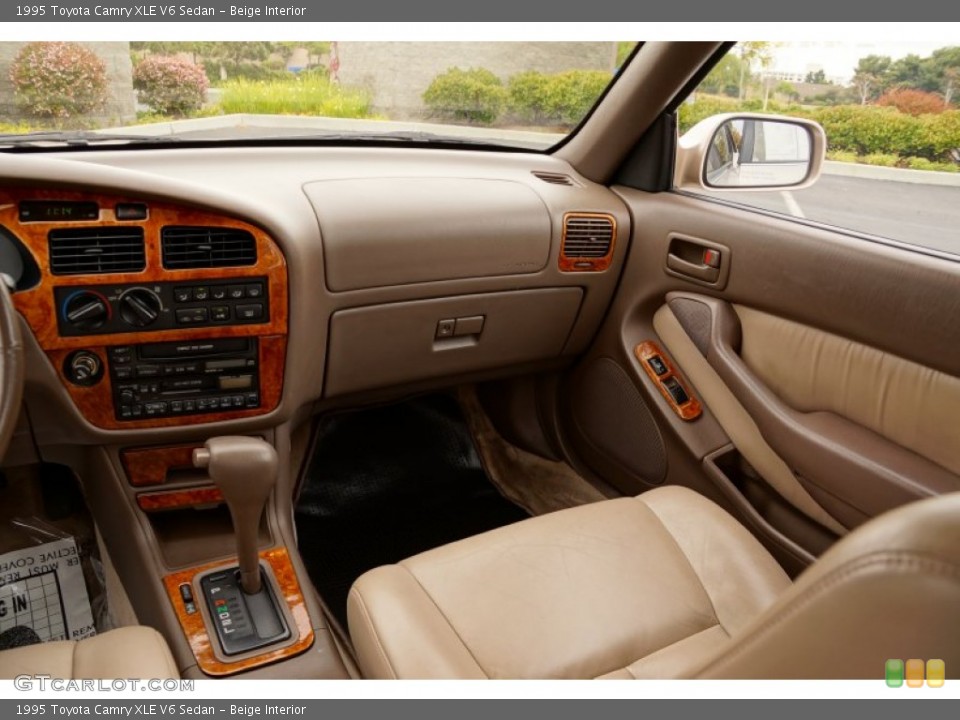 Beige Interior Dashboard for the 1995 Toyota Camry XLE V6 Sedan #82634212