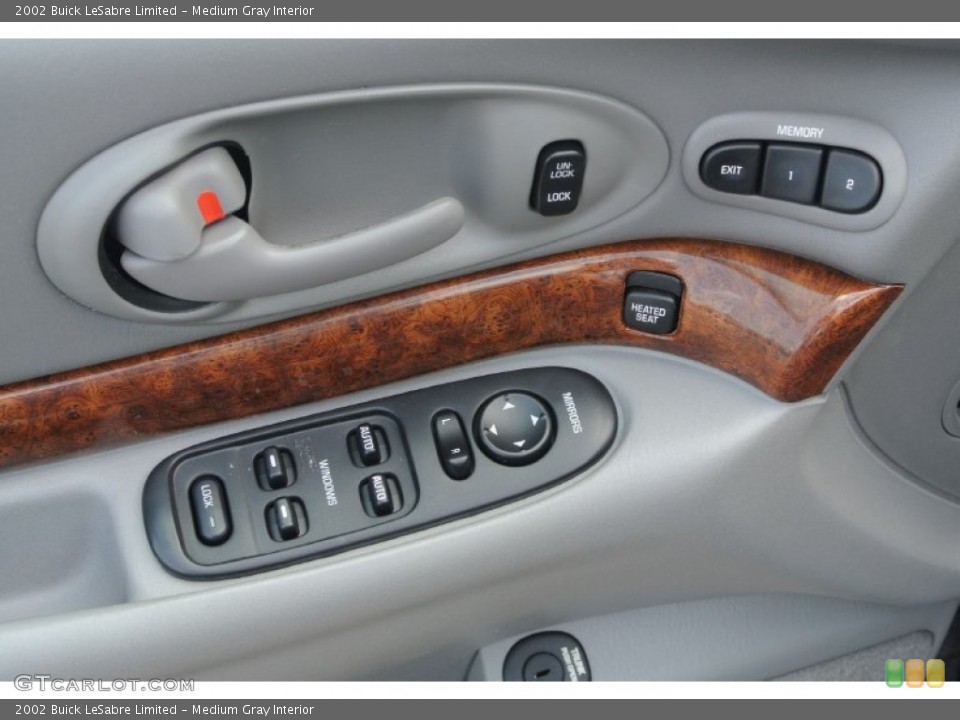 Medium Gray Interior Controls for the 2002 Buick LeSabre Limited #82659202