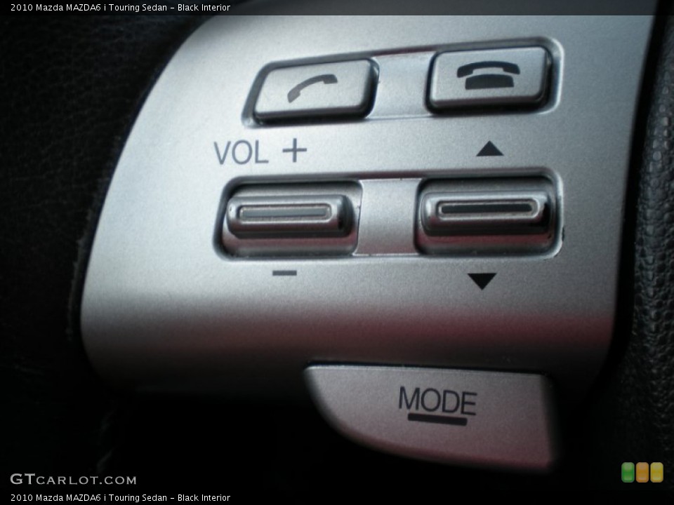 Black Interior Controls for the 2010 Mazda MAZDA6 i Touring Sedan #82712926