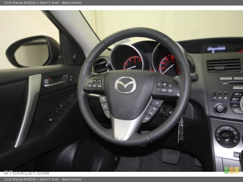 Black Interior Steering Wheel for the 2010 Mazda MAZDA3 s Sport 5 Door #82724500