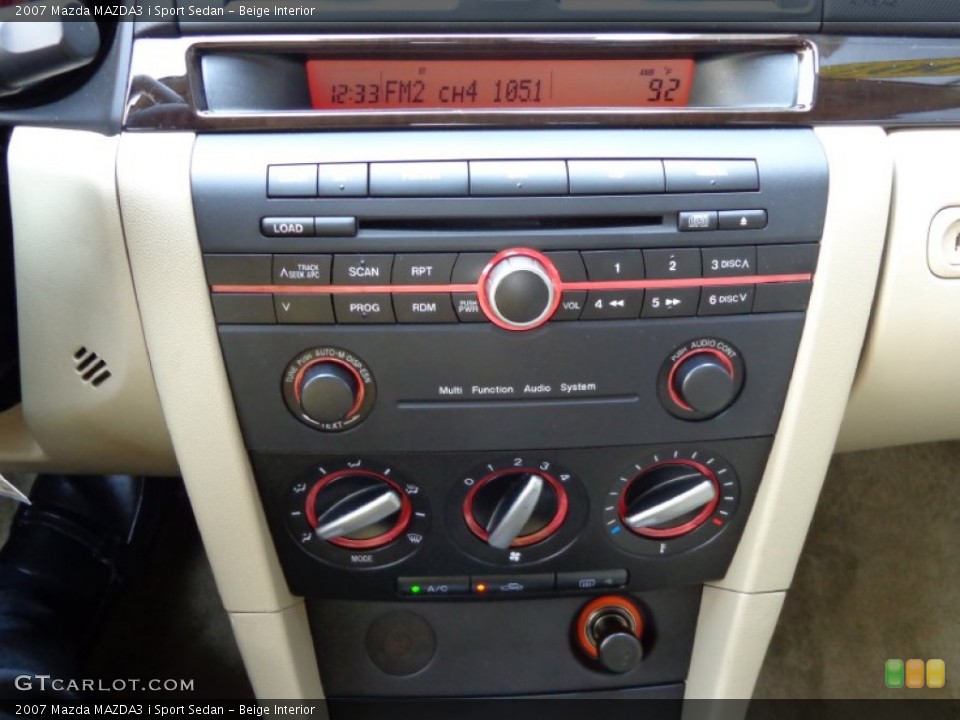 Beige Interior Controls for the 2007 Mazda MAZDA3 i Sport Sedan #82729045