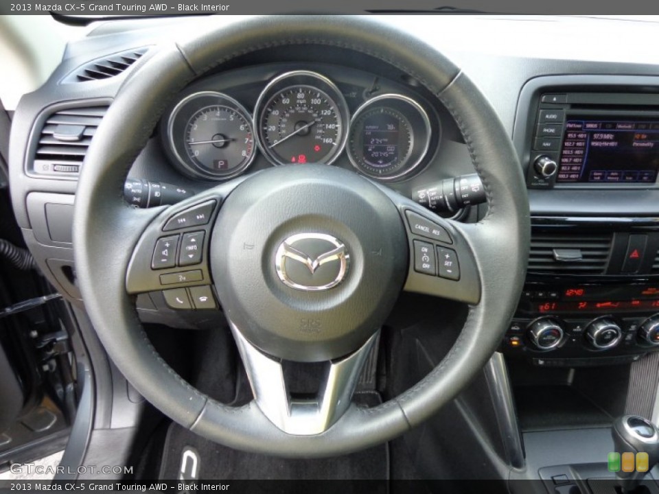 Black Interior Steering Wheel for the 2013 Mazda CX-5 Grand Touring AWD #82729258