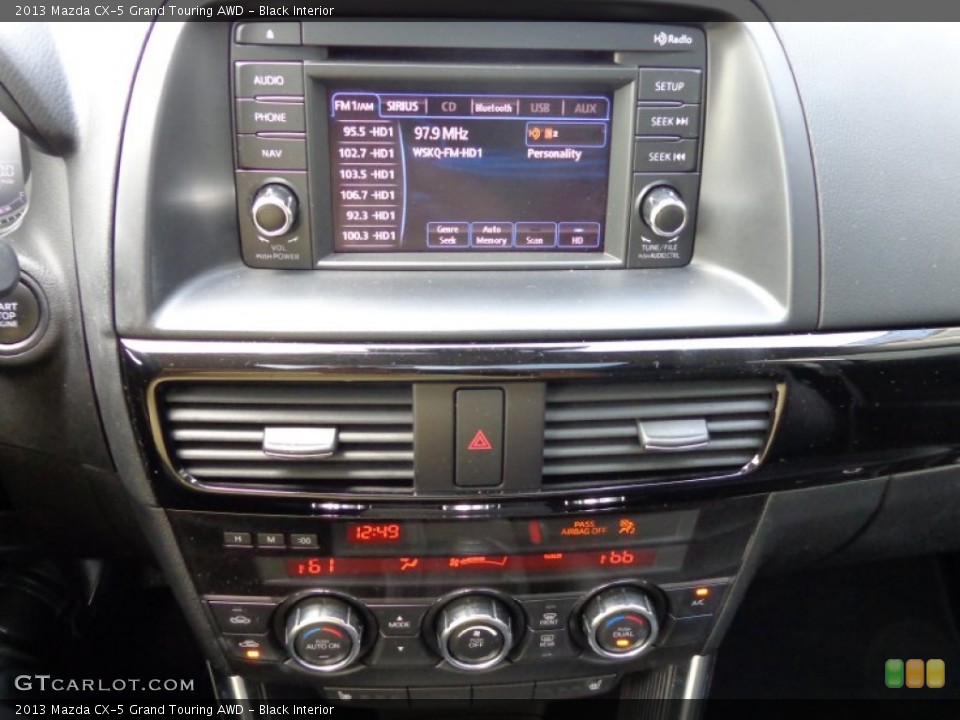 Black Interior Controls for the 2013 Mazda CX-5 Grand Touring AWD #82729297