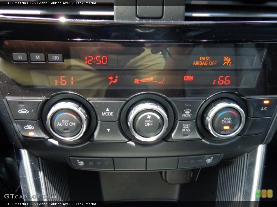 Black Interior Controls for the 2013 Mazda CX-5 Grand Touring AWD #82729336