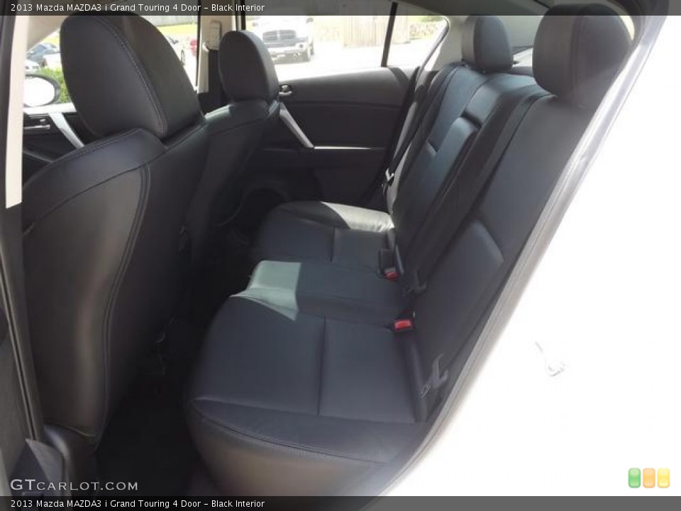 Black Interior Rear Seat for the 2013 Mazda MAZDA3 i Grand Touring 4 Door #82753891