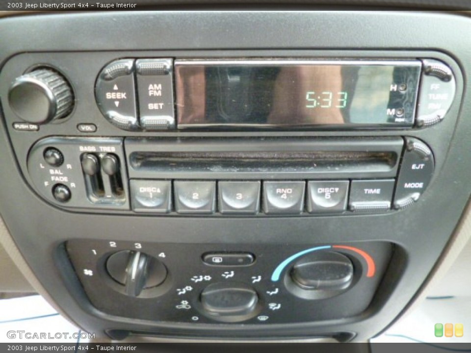 Taupe Interior Controls for the 2003 Jeep Liberty Sport 4x4 #82769256