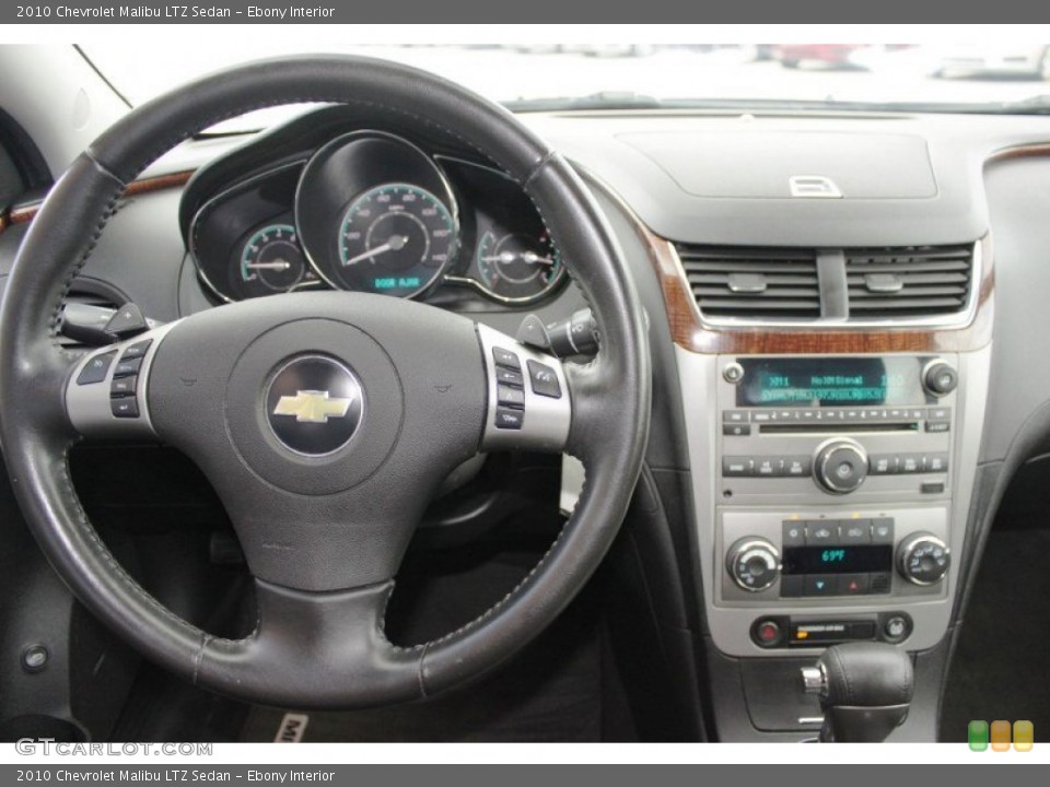 Ebony Interior Steering Wheel for the 2010 Chevrolet Malibu LTZ Sedan #82772299