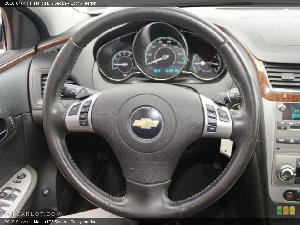 Ebony Interior Steering Wheel for the 2010 Chevrolet Malibu LTZ Sedan #82772721