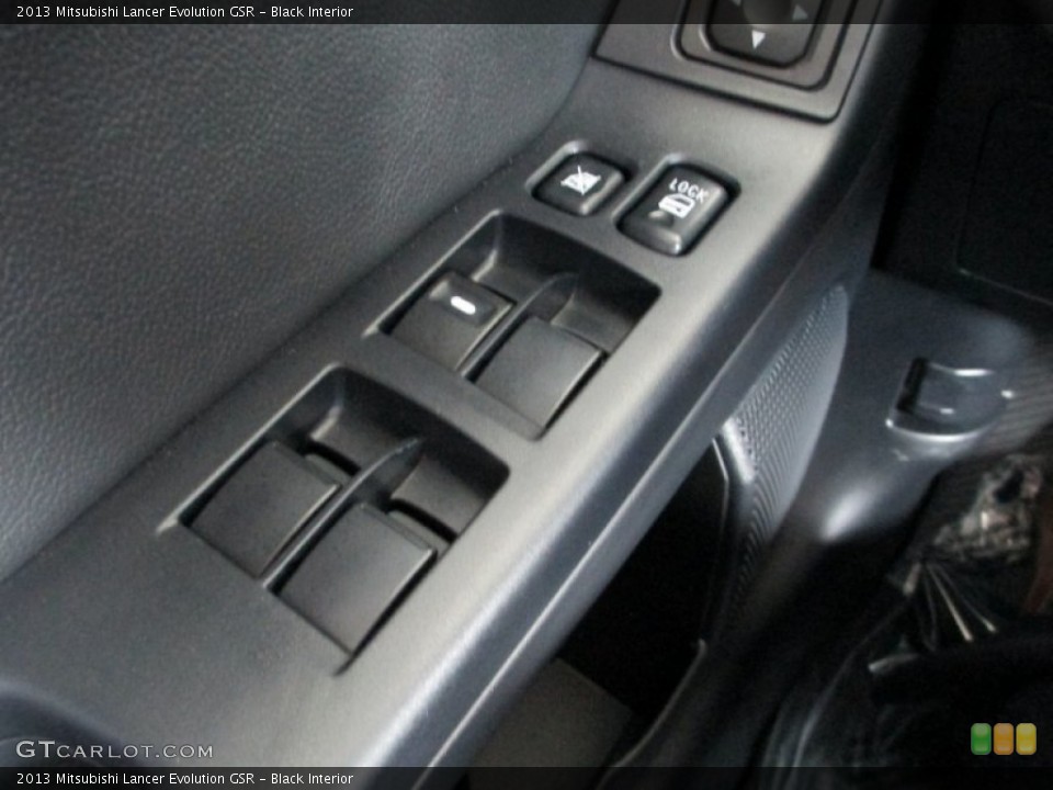 Black Interior Controls for the 2013 Mitsubishi Lancer Evolution GSR #82782982