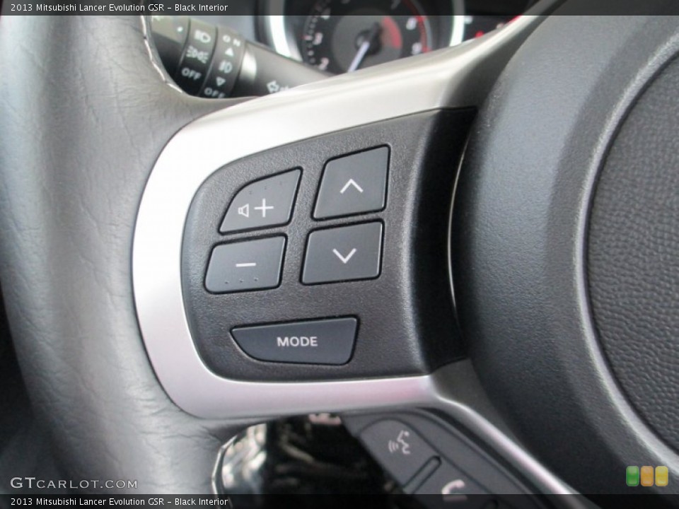 Black Interior Controls for the 2013 Mitsubishi Lancer Evolution GSR #82783027