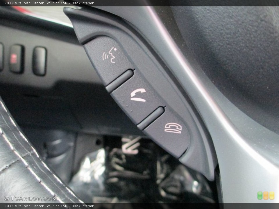 Black Interior Controls for the 2013 Mitsubishi Lancer Evolution GSR #82783060