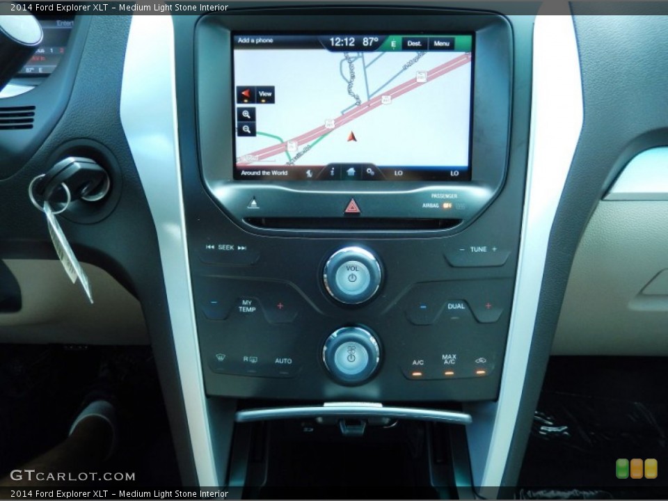 Medium Light Stone Interior Controls for the 2014 Ford Explorer XLT #82797326