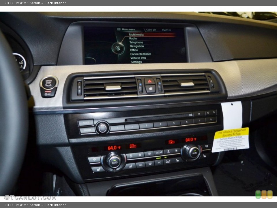 Black Interior Controls for the 2013 BMW M5 Sedan #82834549