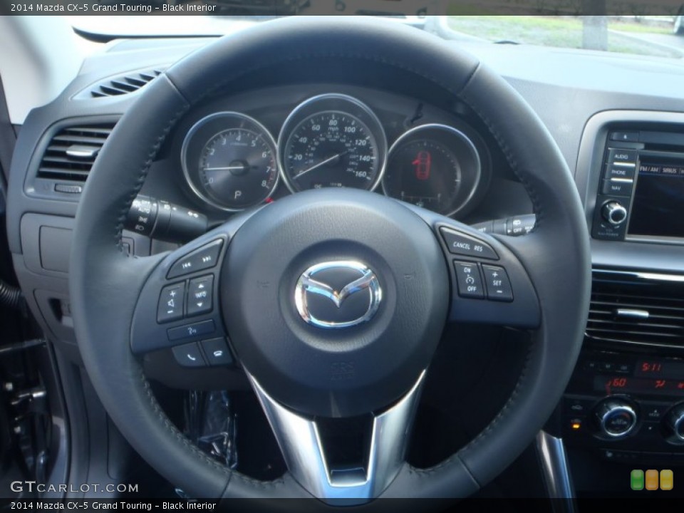Black Interior Steering Wheel for the 2014 Mazda CX-5 Grand Touring #82852585