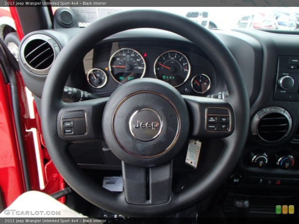 Black Interior Steering Wheel for the 2013 Jeep Wrangler Unlimited Sport 4x4 #82864590