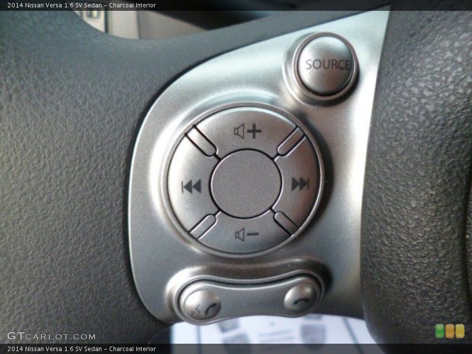 Charcoal Interior Controls for the 2014 Nissan Versa 1.6 SV Sedan #82901890