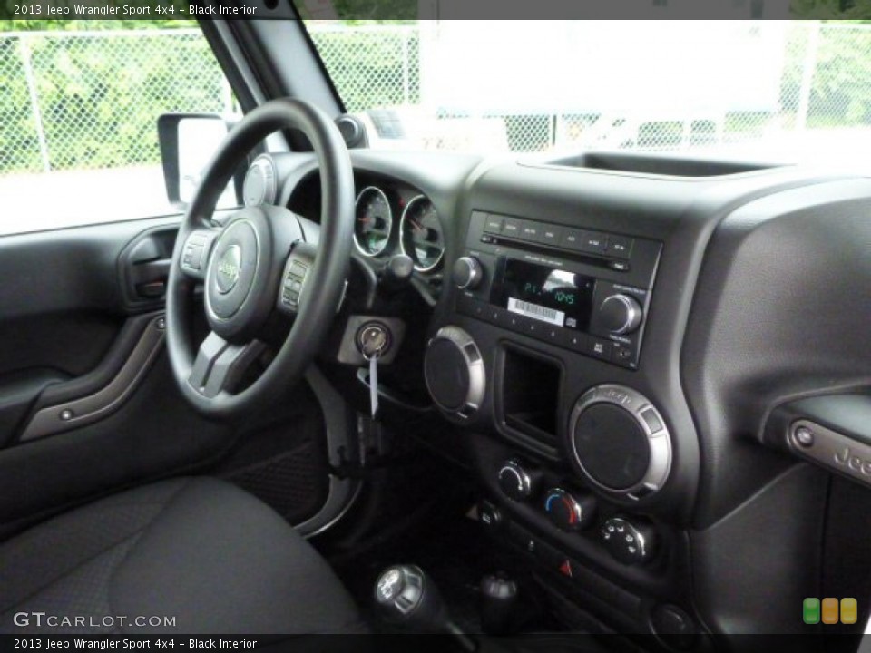Black Interior Dashboard for the 2013 Jeep Wrangler Sport 4x4 #82905207