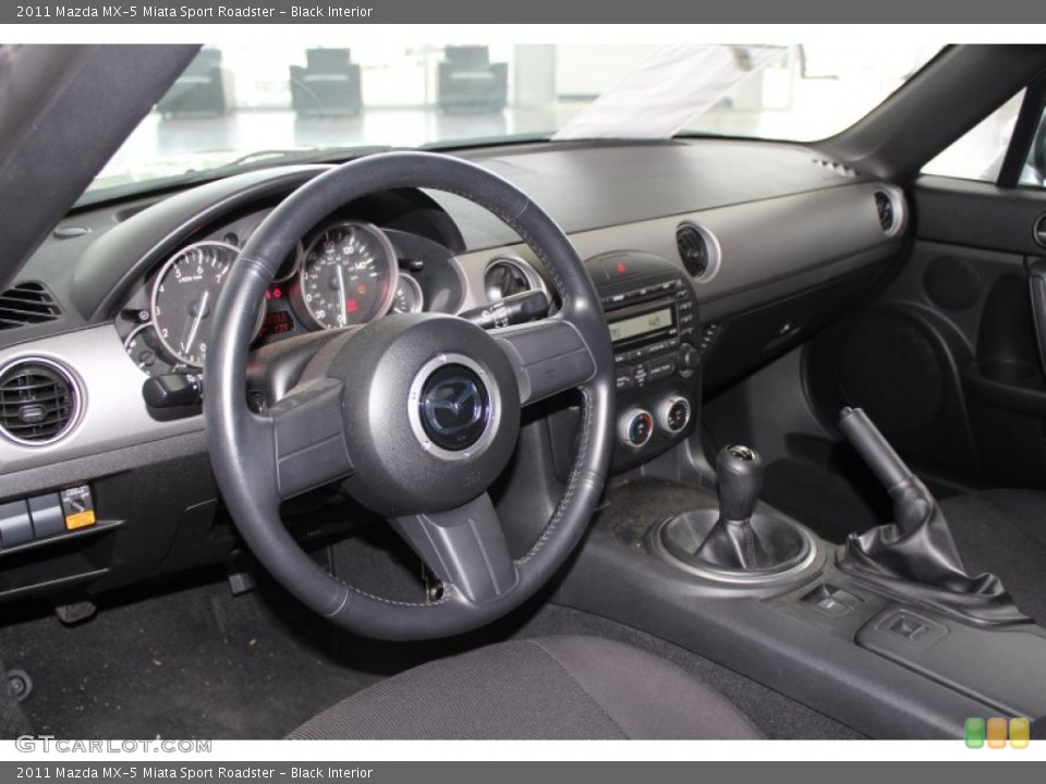 Black Interior Dashboard for the 2011 Mazda MX-5 Miata Sport Roadster #82910548