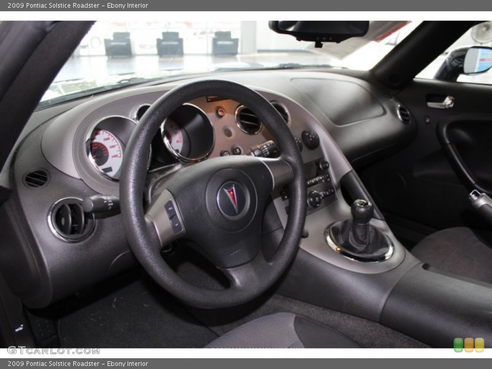 Ebony Interior Dashboard for the 2009 Pontiac Solstice Roadster #82911745