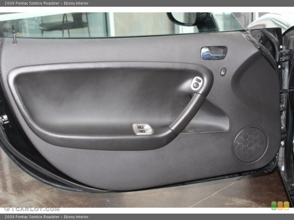 Ebony Interior Door Panel for the 2009 Pontiac Solstice Roadster #82911814