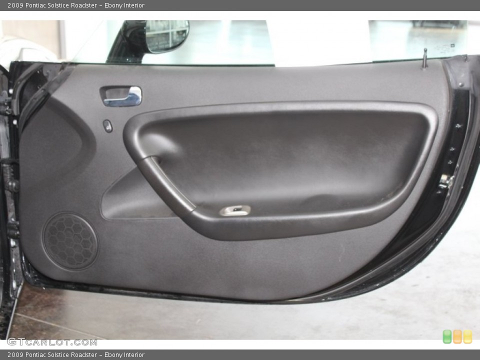 Ebony Interior Door Panel for the 2009 Pontiac Solstice Roadster #82911860