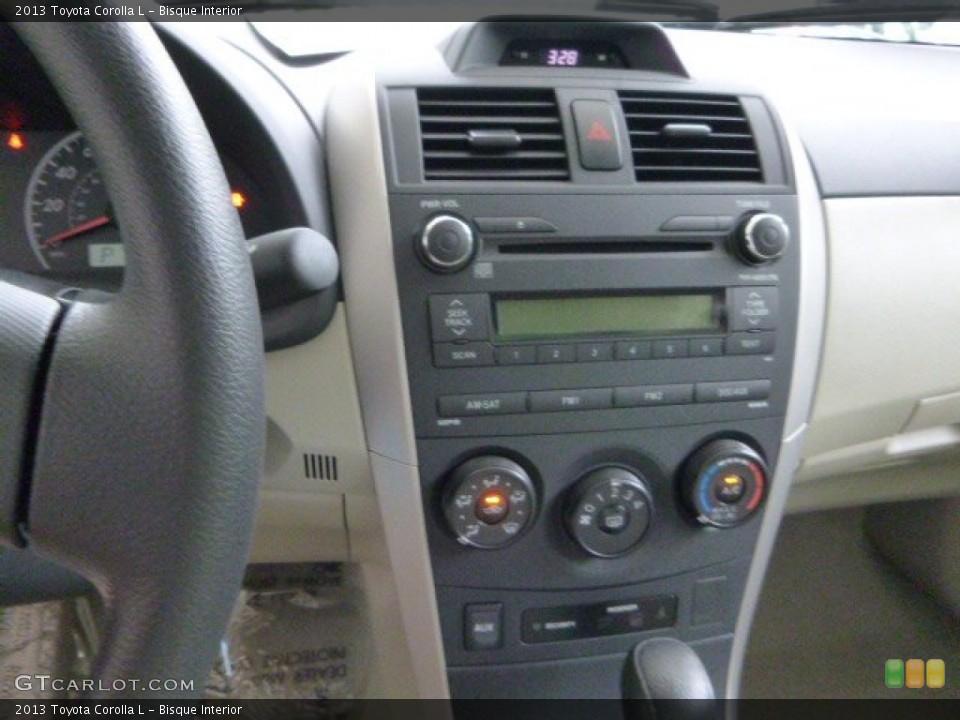 Bisque Interior Controls for the 2013 Toyota Corolla L #82924398