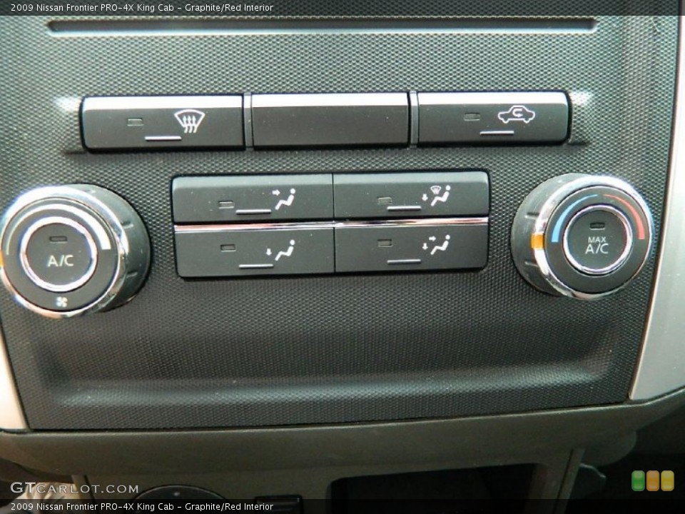Graphite/Red Interior Controls for the 2009 Nissan Frontier PRO-4X King Cab #82927492