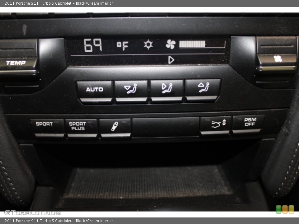 Black/Cream Interior Controls for the 2011 Porsche 911 Turbo S Cabriolet #82936197