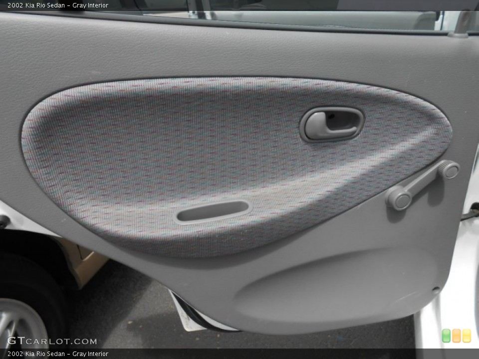 Gray Interior Door Panel for the 2002 Kia Rio Sedan #82936396
