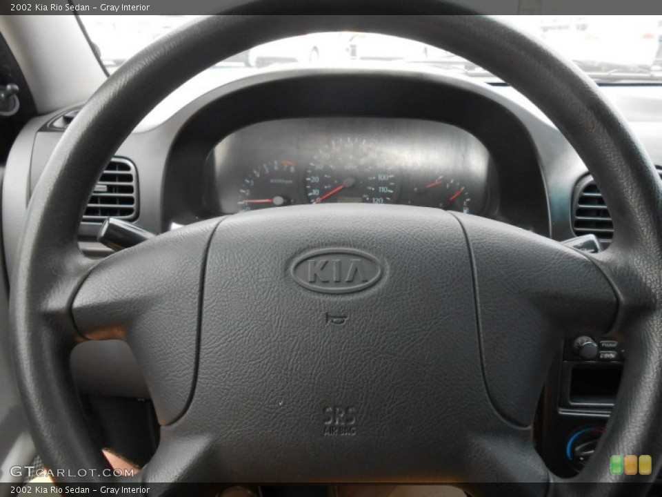 Gray Interior Steering Wheel for the 2002 Kia Rio Sedan #82936468