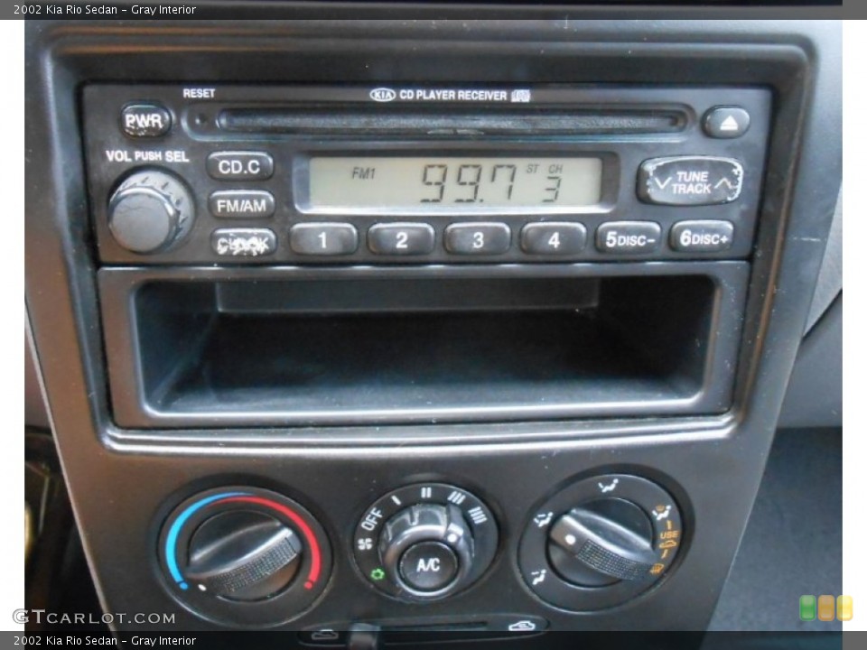 Gray Interior Controls for the 2002 Kia Rio Sedan #82936542