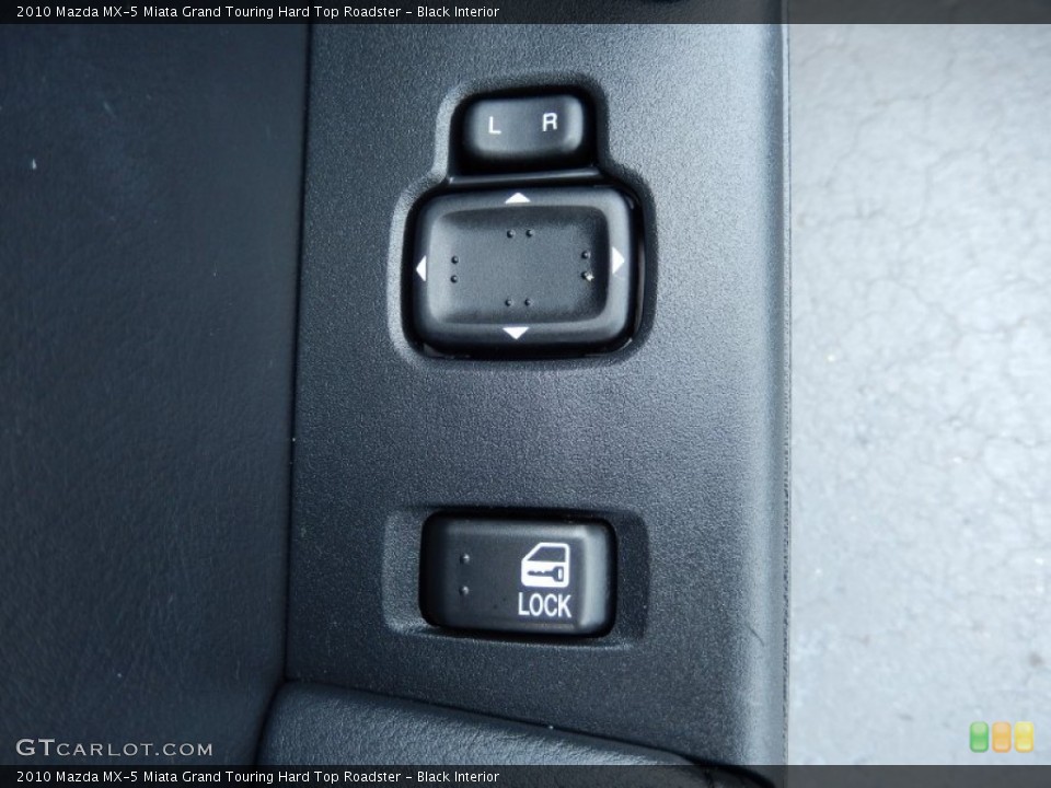 Black Interior Controls for the 2010 Mazda MX-5 Miata Grand Touring Hard Top Roadster #82942420
