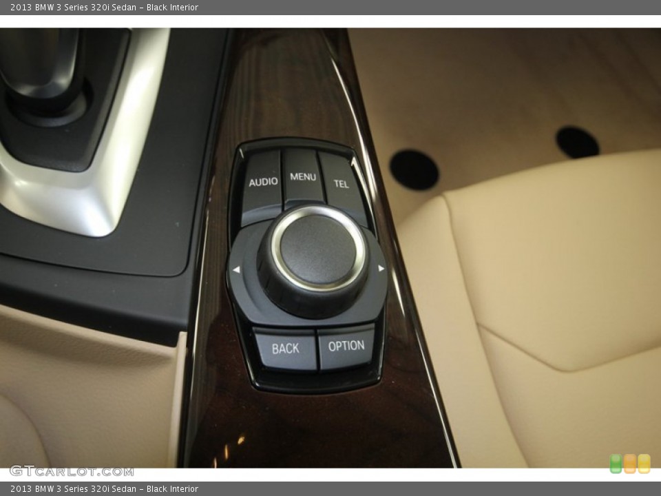 Black Interior Controls for the 2013 BMW 3 Series 320i Sedan #82953900