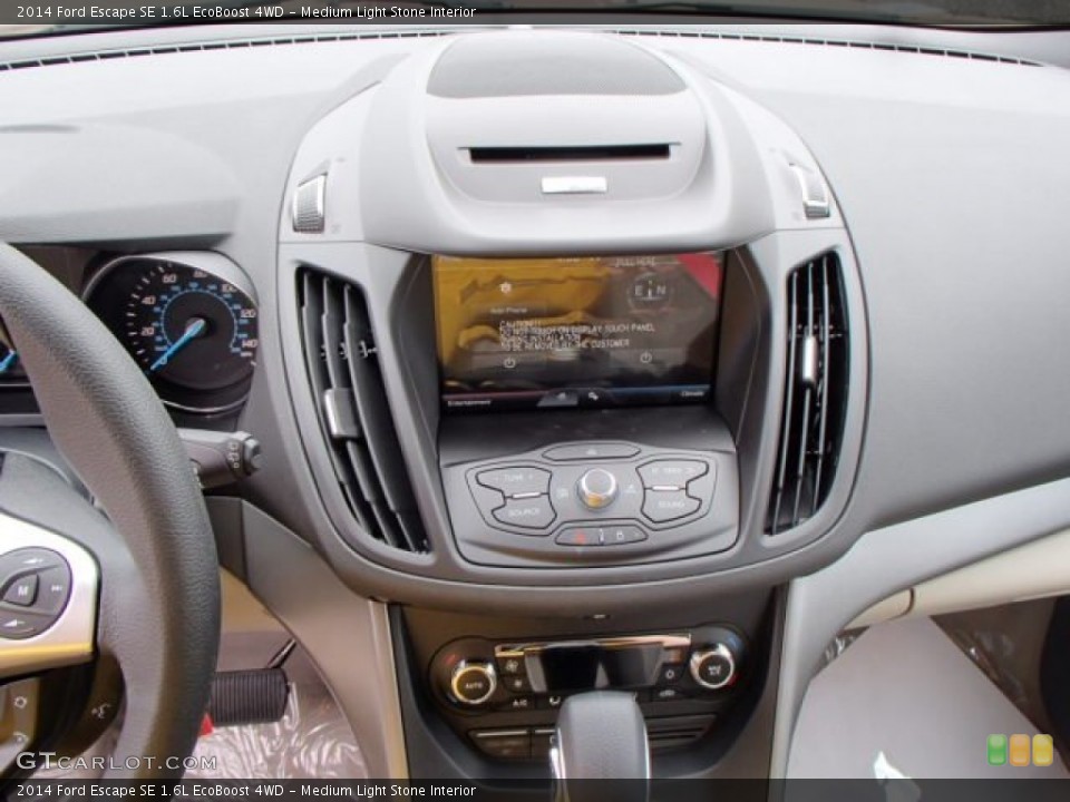 Medium Light Stone Interior Controls for the 2014 Ford Escape SE 1.6L EcoBoost 4WD #82958481