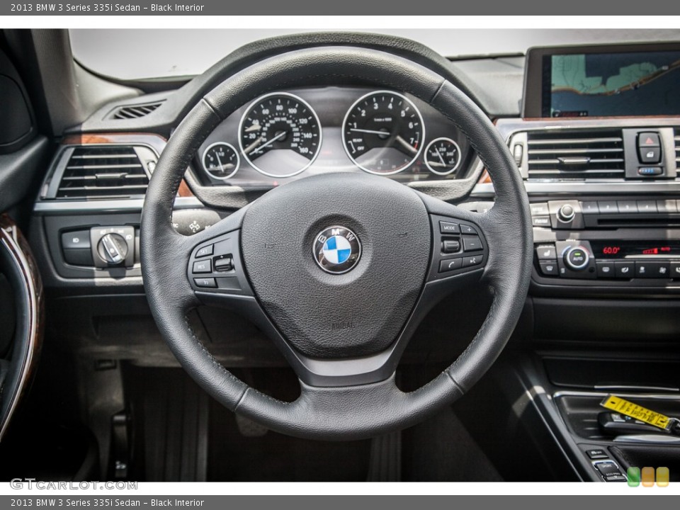 Black Interior Steering Wheel for the 2013 BMW 3 Series 335i Sedan #82971478