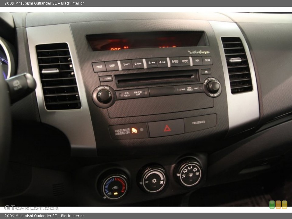 Black Interior Controls for the 2009 Mitsubishi Outlander SE #82976693