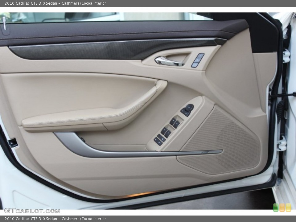 Cashmere/Cocoa Interior Door Panel for the 2010 Cadillac CTS 3.0 Sedan #82978919