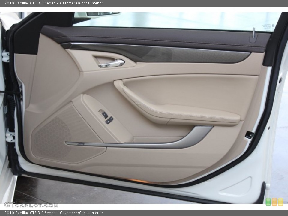 Cashmere/Cocoa Interior Door Panel for the 2010 Cadillac CTS 3.0 Sedan #82978964