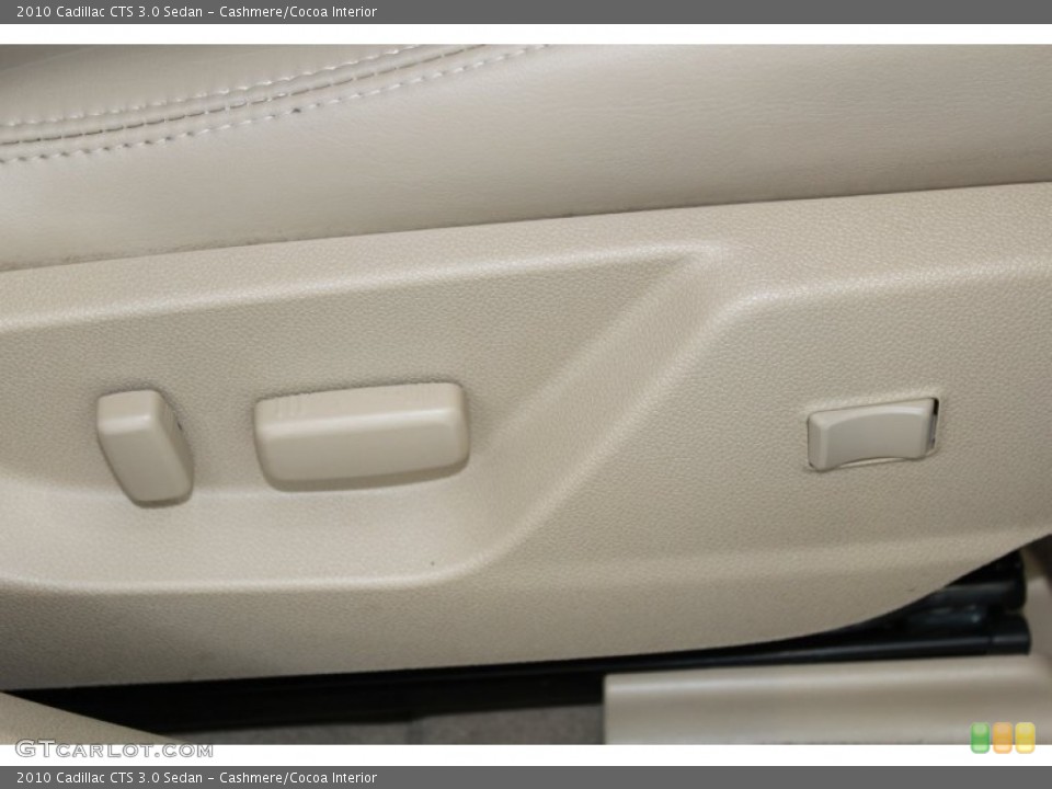 Cashmere/Cocoa Interior Controls for the 2010 Cadillac CTS 3.0 Sedan #82979307