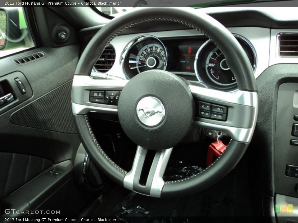 Charcoal Black Interior Steering Wheel for the 2013 Ford Mustang GT Premium Coupe #83023578