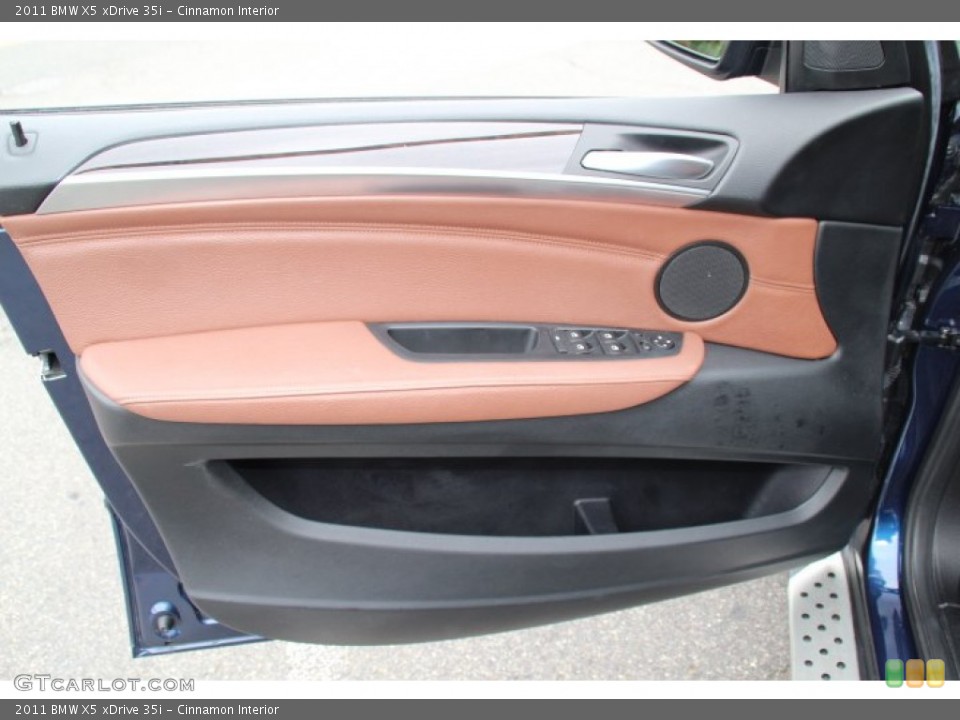 Cinnamon Interior Door Panel for the 2011 BMW X5 xDrive 35i #83066069