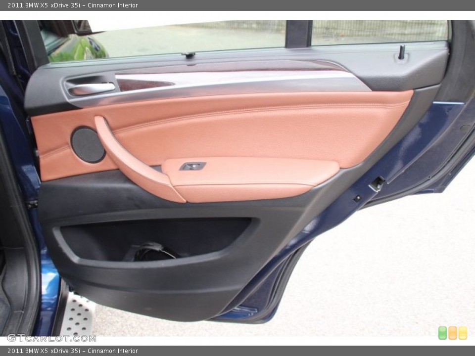 Cinnamon Interior Door Panel for the 2011 BMW X5 xDrive 35i #83066232