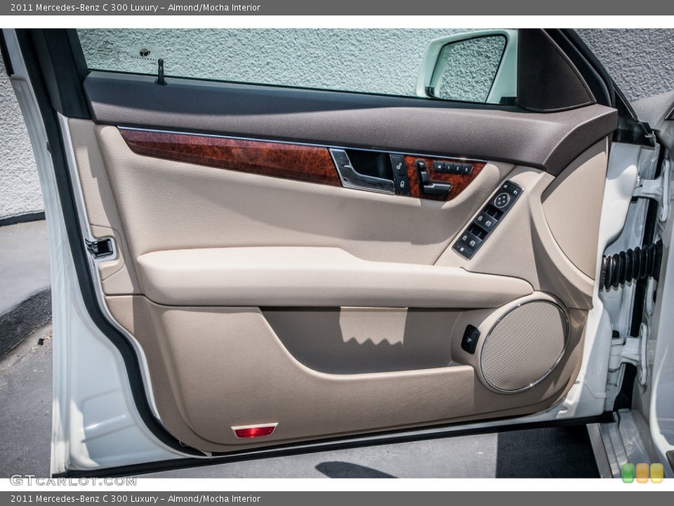 Almond/Mocha Interior Door Panel for the 2011 Mercedes-Benz C 300 Luxury #83091054